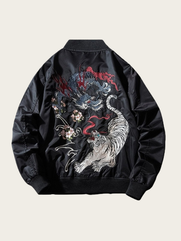 Black bomber jacket with dragon and tiger embroidery on a beige background
