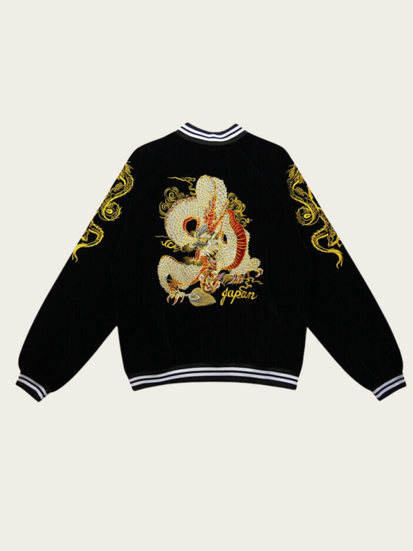 Black jacket with dragon embroidery on a beige background