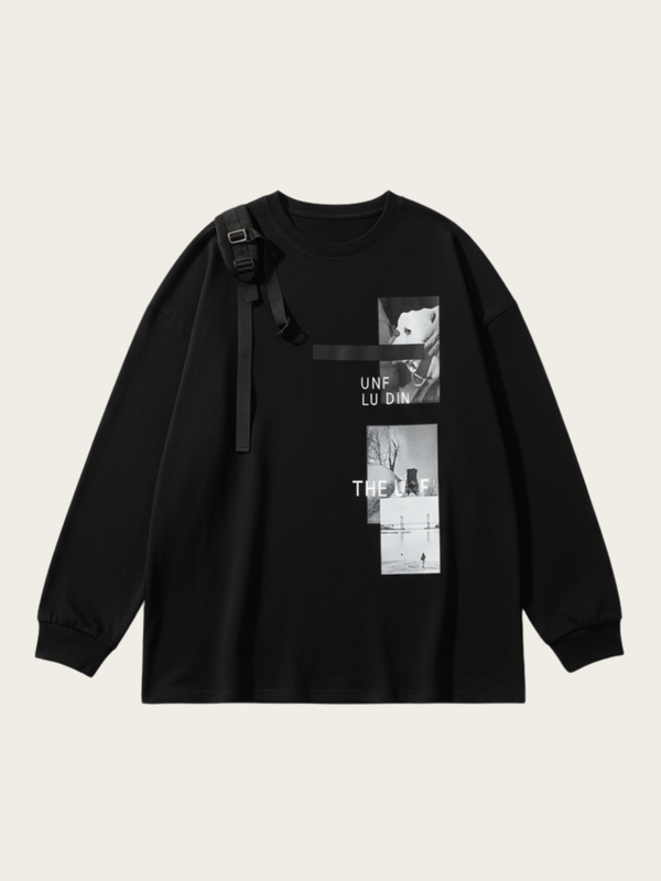 Black sweatshirt with graphic design on a beige background