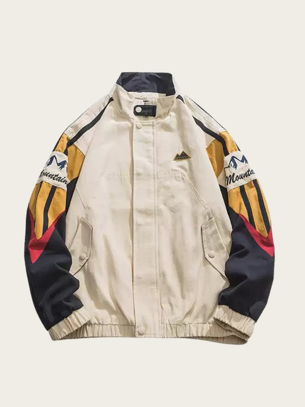 Beige jacket with colorful accents and brand logos on a white background