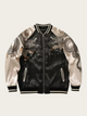 Black and white jacket with dragon and floral embroidery on a light gray background