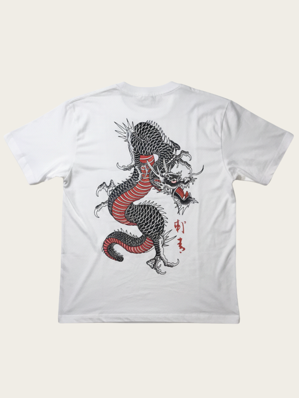 White t-shirt with a black and red dragon design on a beige background