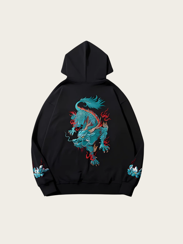 Black hoodie with a colorful dragon design on a beige background