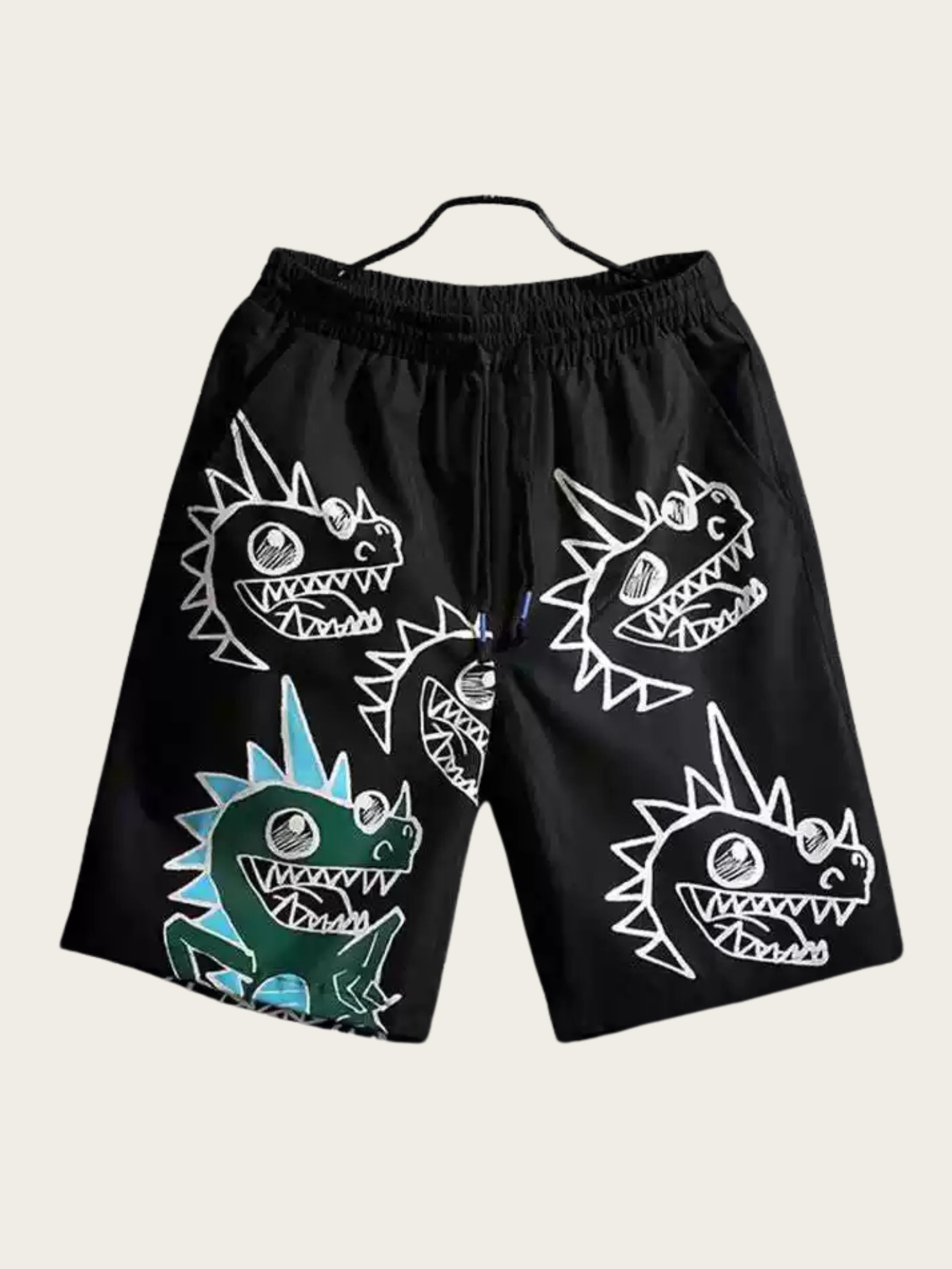 Black shorts with colorful shark designs on a white background