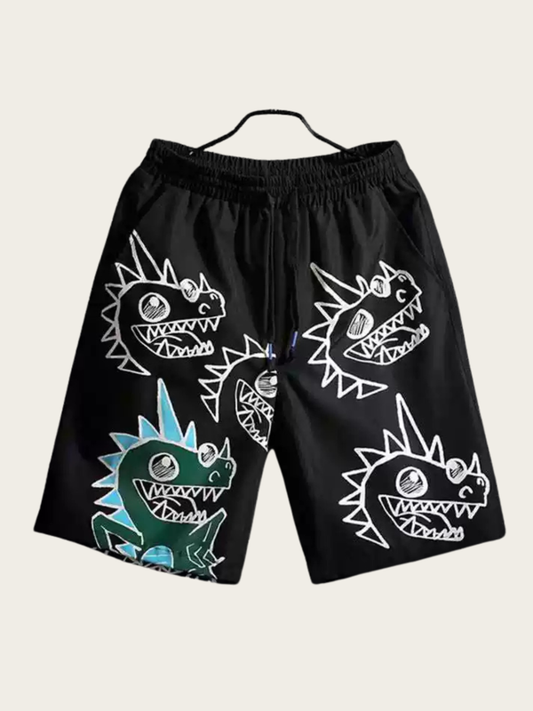 Black shorts with colorful shark designs on a white background