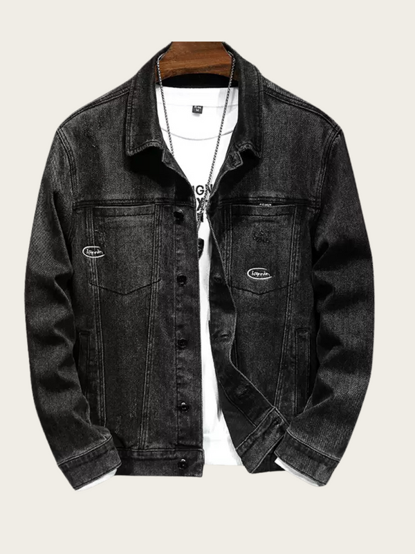 Black denim jacket on a white background