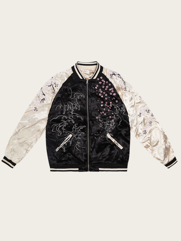 Black and white jacket with intricate designs on a beige background
