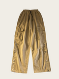 Khaki cargo pants on a beige background