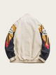 Beige jacket with colorful arm designs on a white background