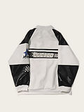 White and black jacket with racing-themed design on a light gray background