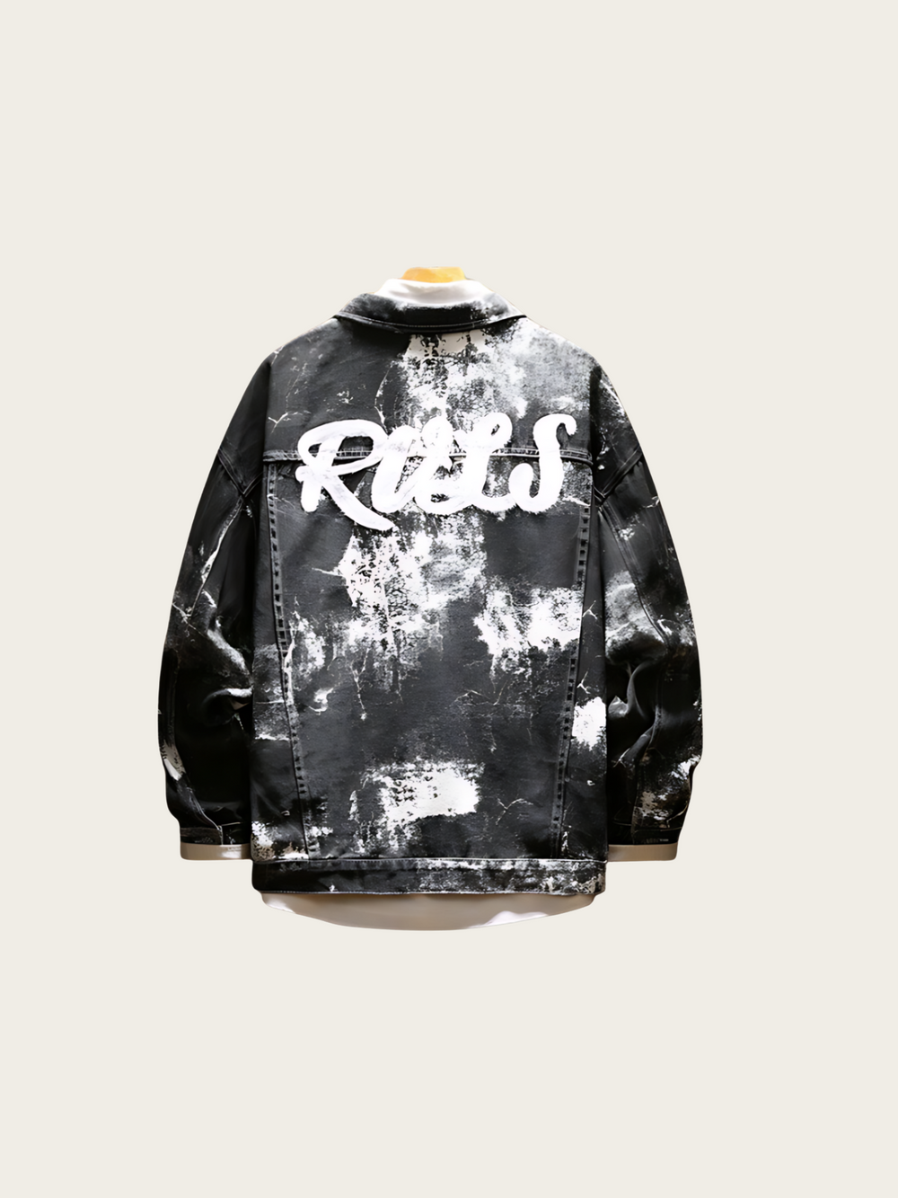 Black and white distressed jacket with 'Ricks' text on a light gray background