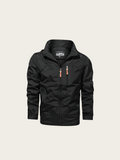 Black jacket with a brand logo on a light gray background