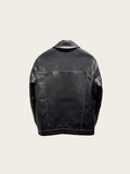 Black leather jacket on a light gray background