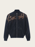 Navy blue jacket with gold lizard embroidery on a beige background