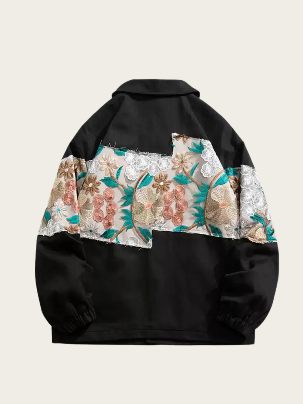 Black hoodie with floral pattern on a beige background