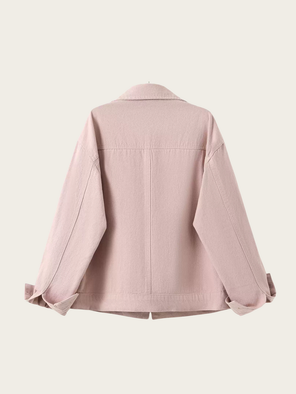 Pink denim jacket on a light pink background