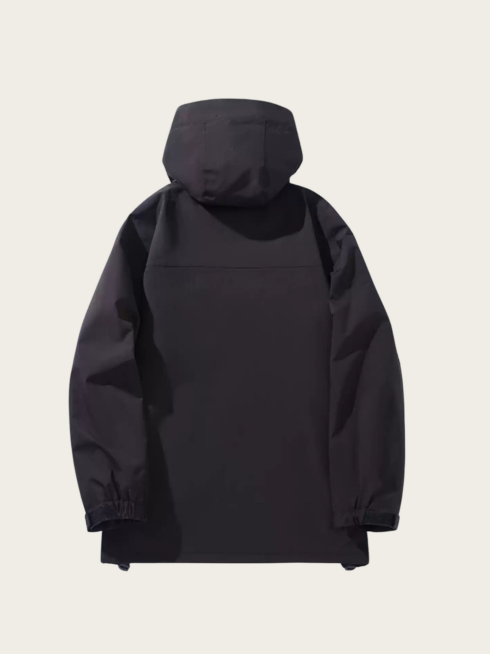 Black hooded jacket on a beige background