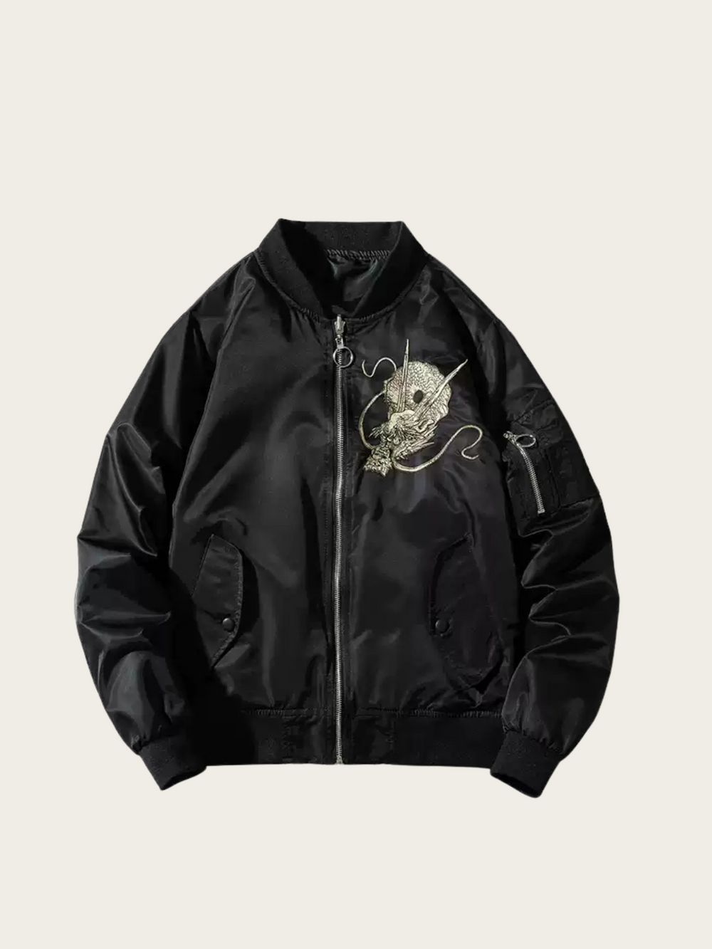 Black bomber jacket with skull design on a beige background