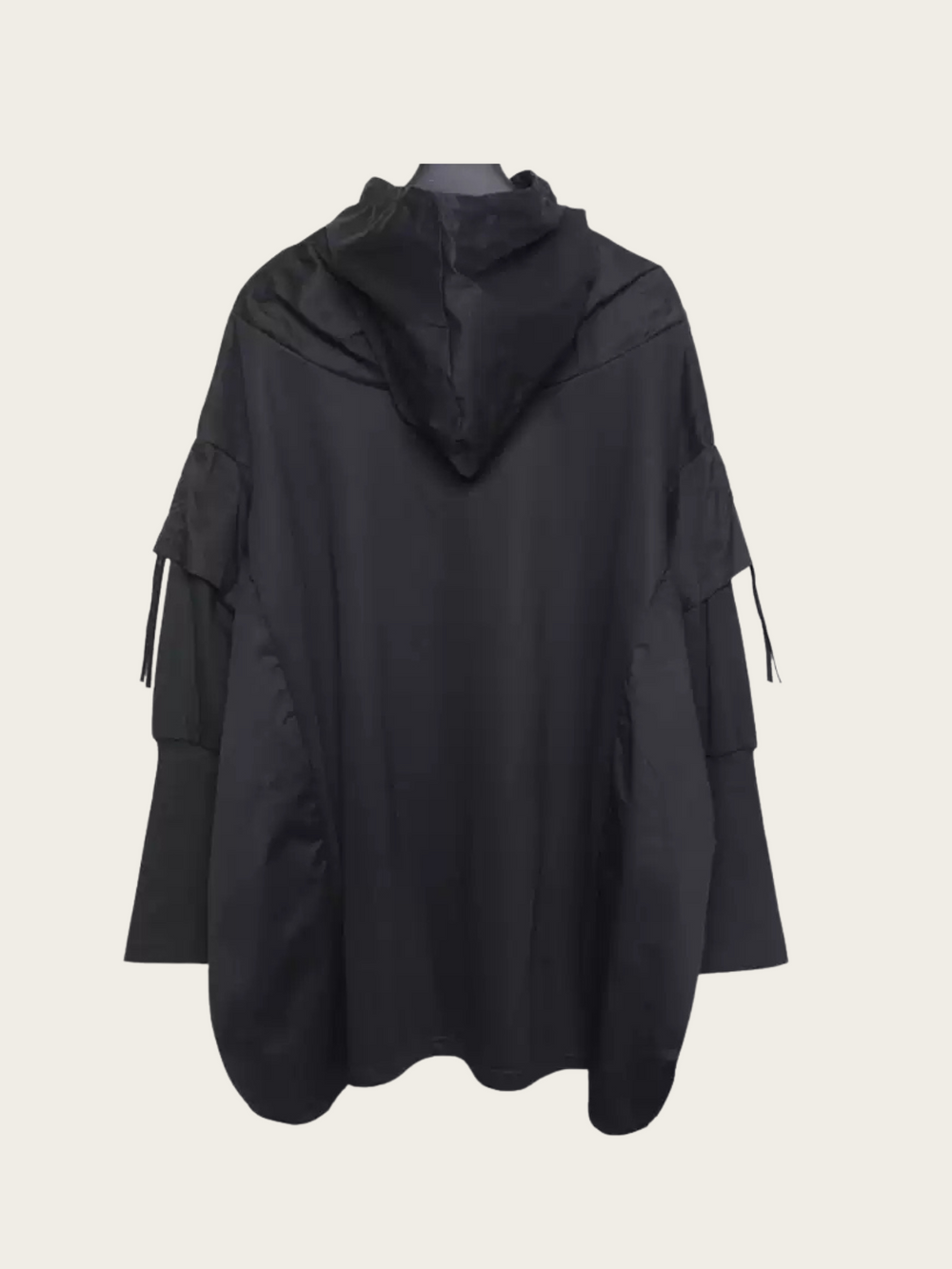 Black hooded jacket on a mannequin against a white background