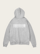 Gray hoodie with a barcode design on the back against a light beige background