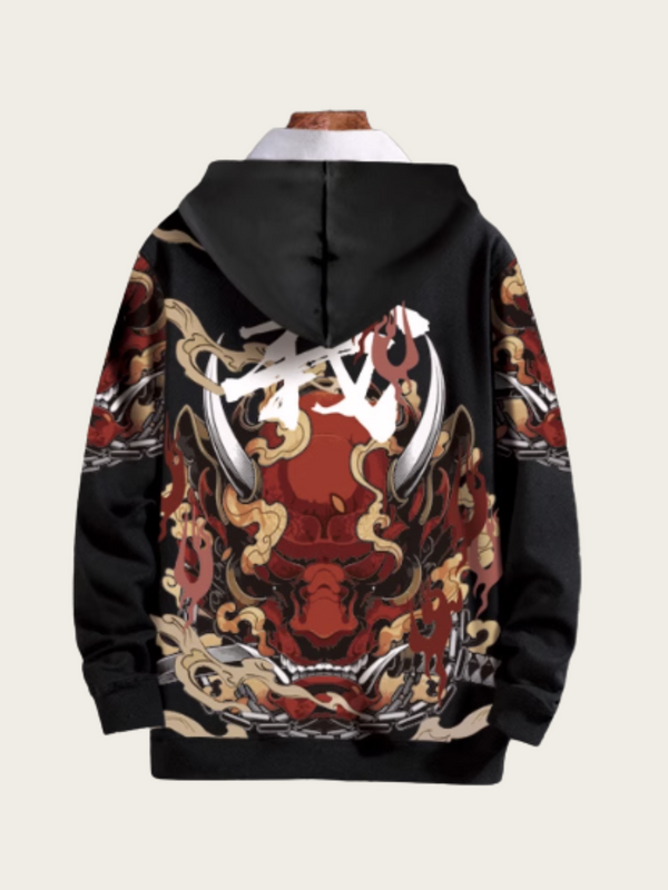 Black hoodie with intricate red and gold design on the back against a beige background