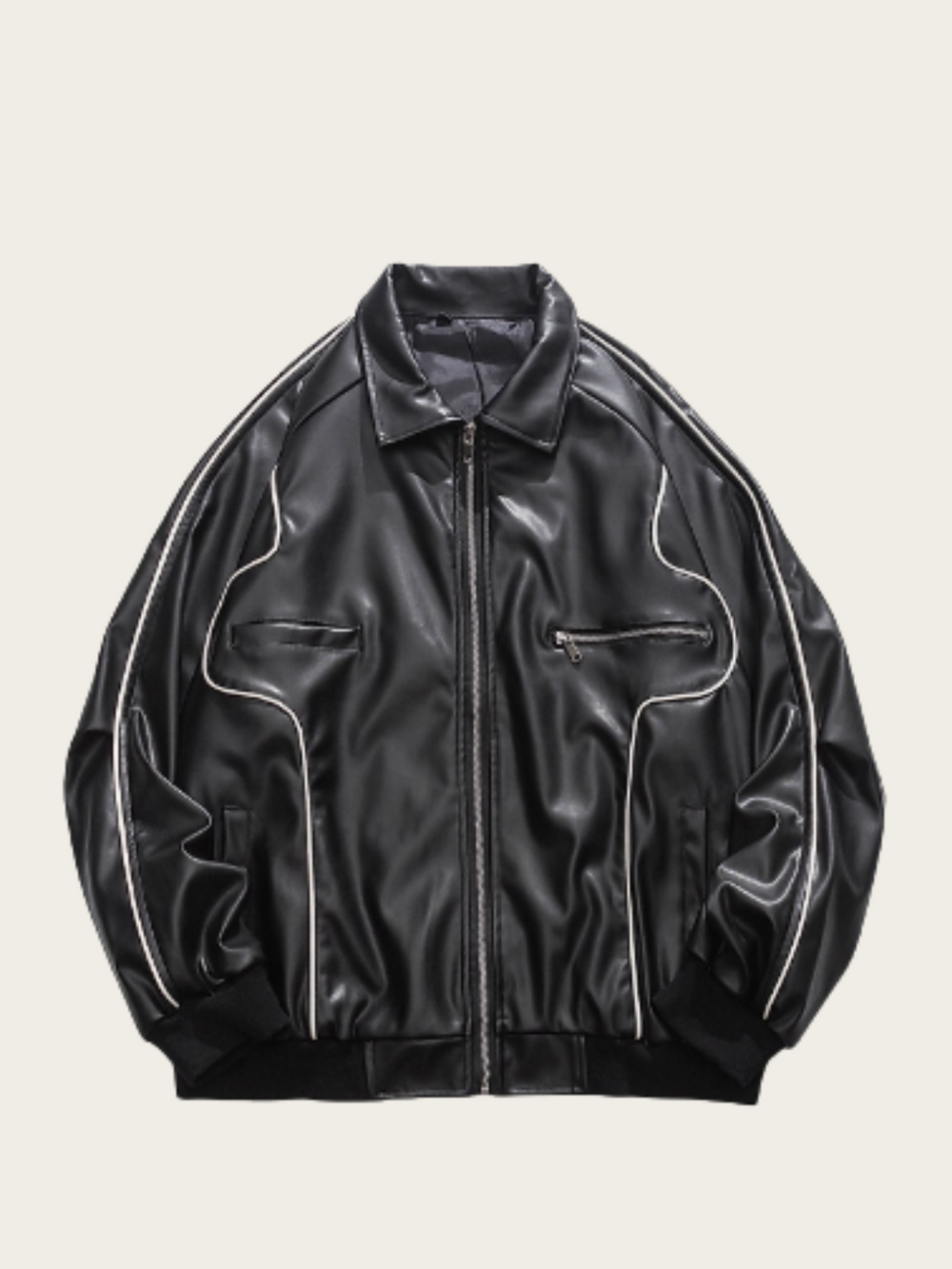 Black leather jacket with white stitching on a beige background