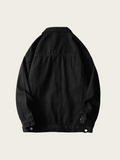 Black jacket on a light beige background