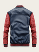 Blue and red varsity jacket on a beige background