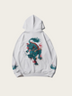White hoodie with a dragon design on a light gray background
