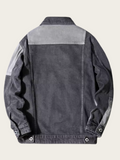 Dark denim jacket with light gray collar on a beige background