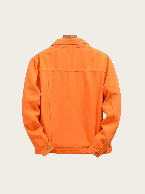 Orange jacket on a mannequin against a light beige background