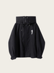 Black skirt with a logo on a beige background