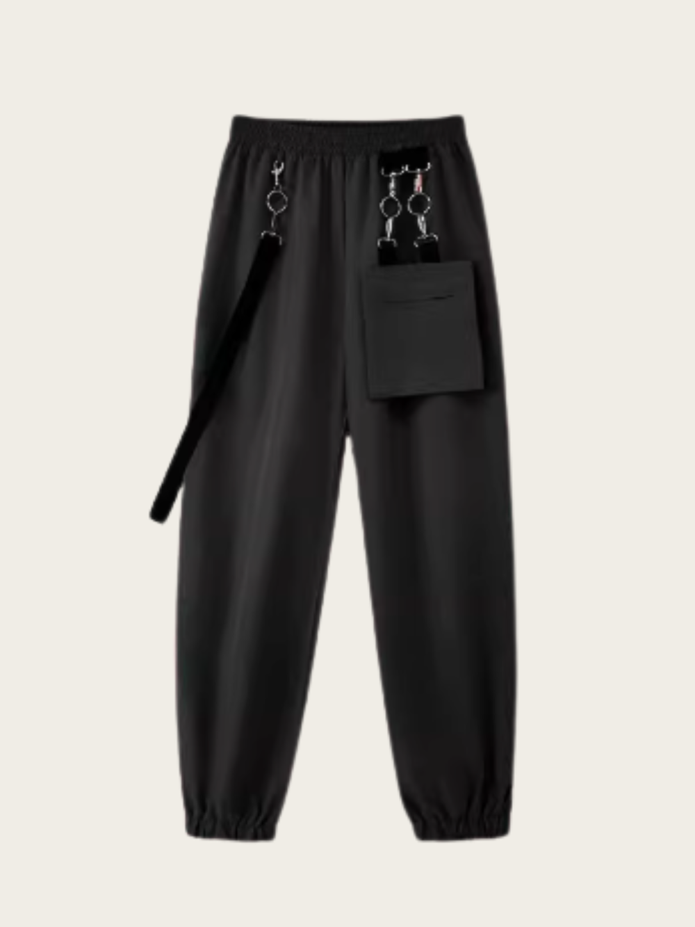 Black pants with suspenders on a light gray background