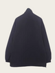 Navy blue sweater on a light beige background