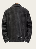 Black denim jacket on a light gray background