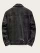 Black denim jacket on a light gray background