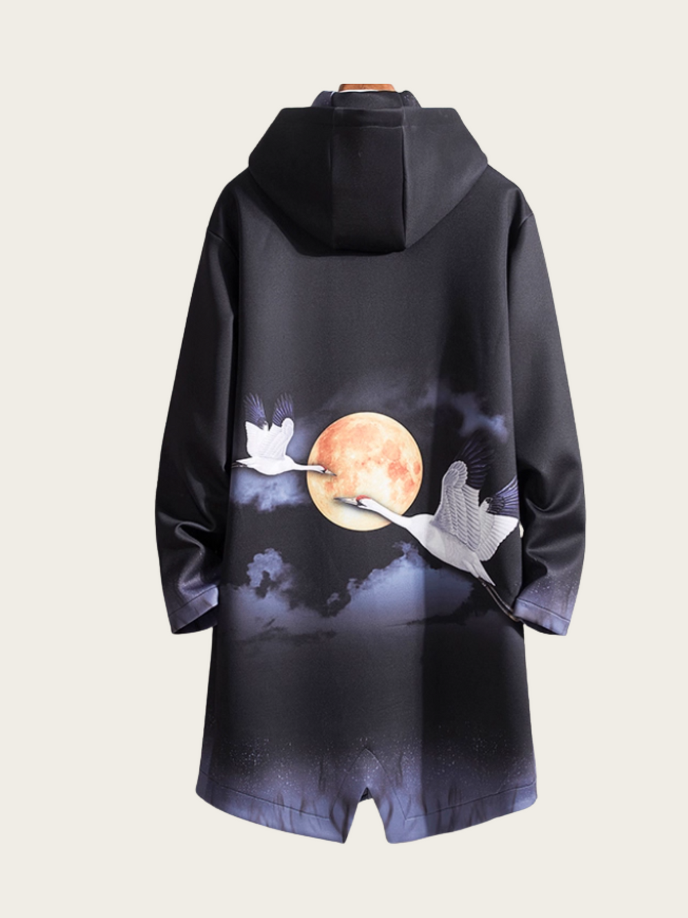 Black hoodie with crane and moon design on a plain background