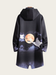 Black hoodie with crane and moon design on a plain background