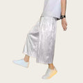 Person wearing white pants and shoes