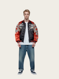Man wearing a colorful jacket with a white background