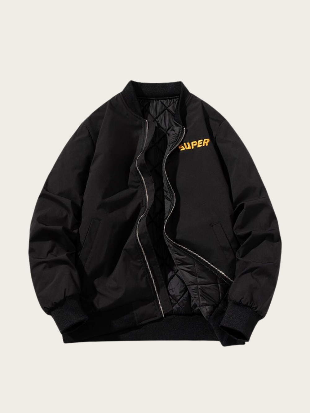 Black jacket with yellow branding on a beige background