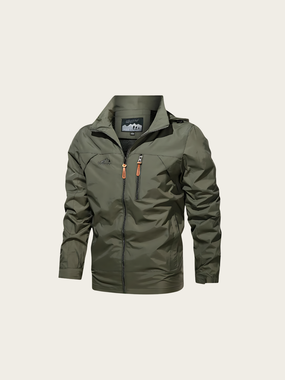 Green jacket with orange zipper on a beige background