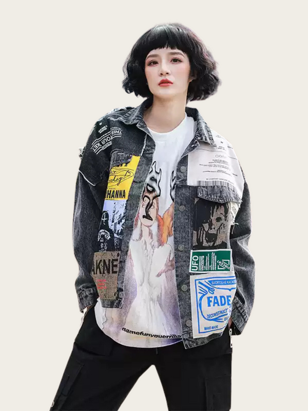 Person wearing a patchwork jacket with various labels on a plain background