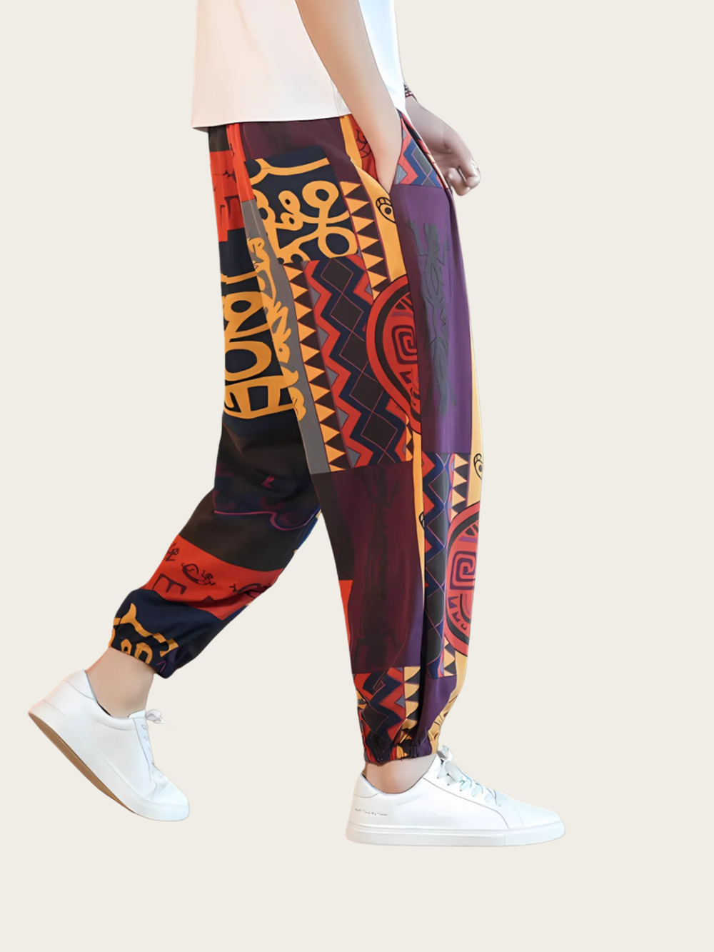 Colorful patterned pants worn by a person on a beige background