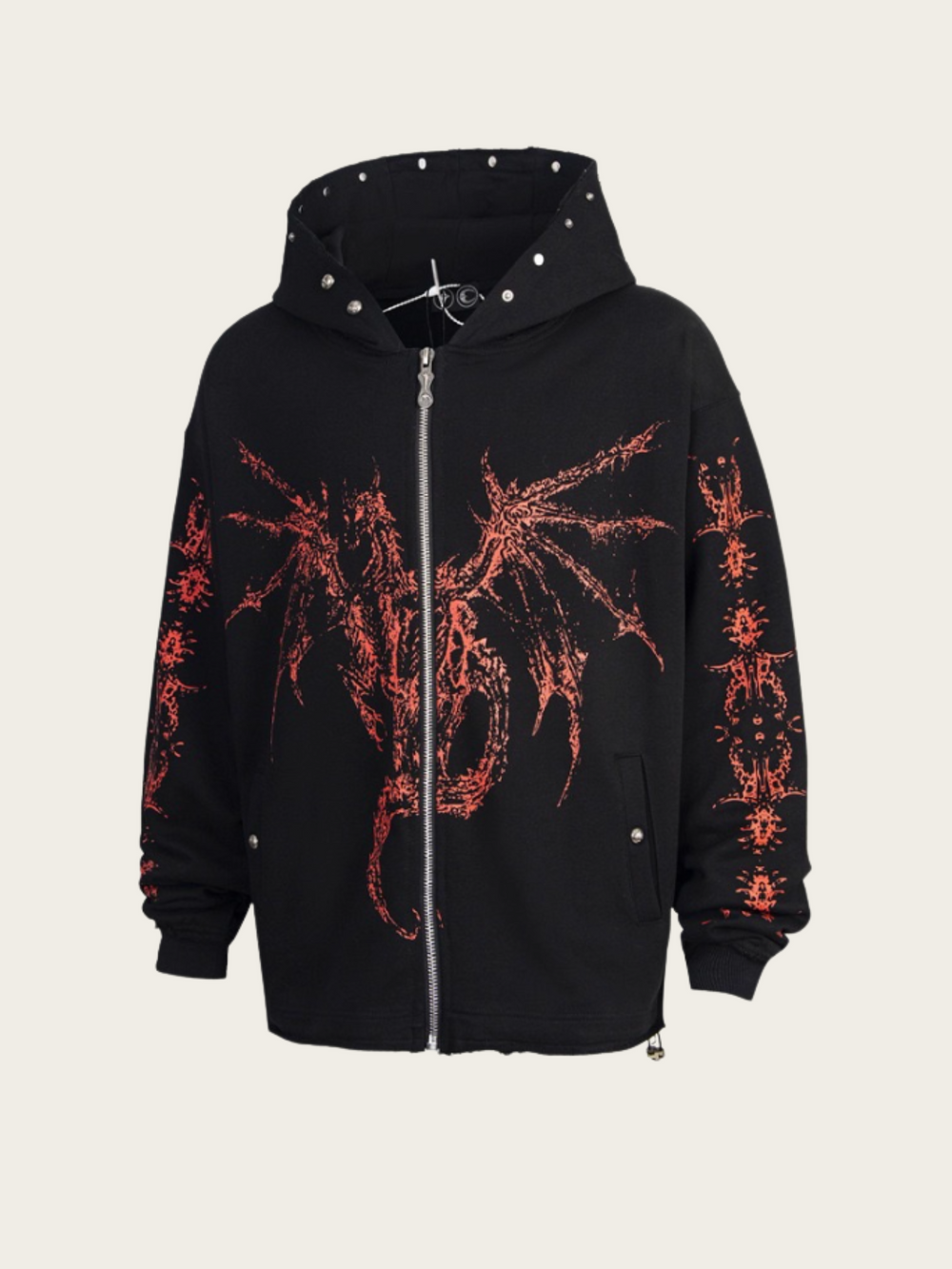 Black hoodie with red designs on a beige background