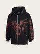 Black hoodie with red designs on a beige background