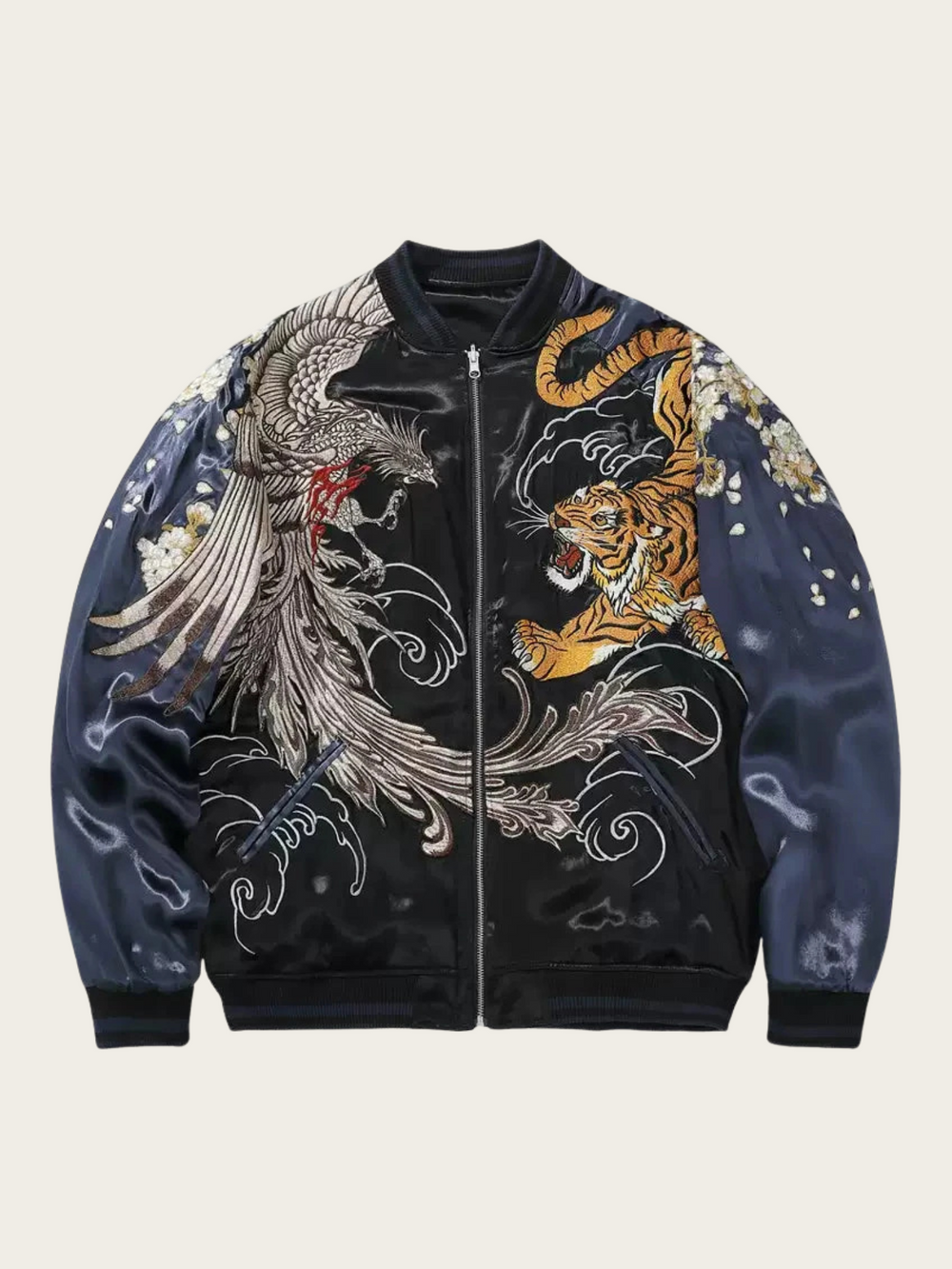 Navy blue bomber jacket with dragon and tiger embroidery on a beige background