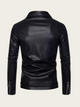 Black leather jacket on a beige background