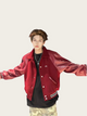 Person wearing a red jacket with a white background