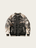 Black and white jacket with dragon embroidery on a beige background